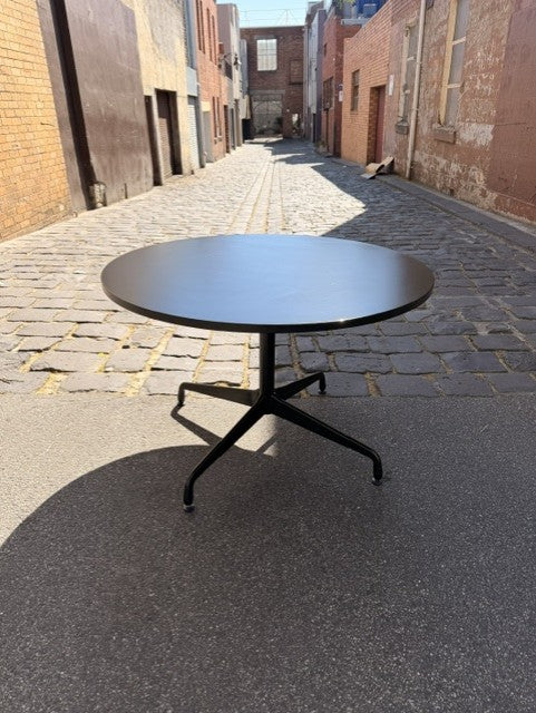 Segmented all black aluminium base table by Charles & Ray Eames for Herman Miller