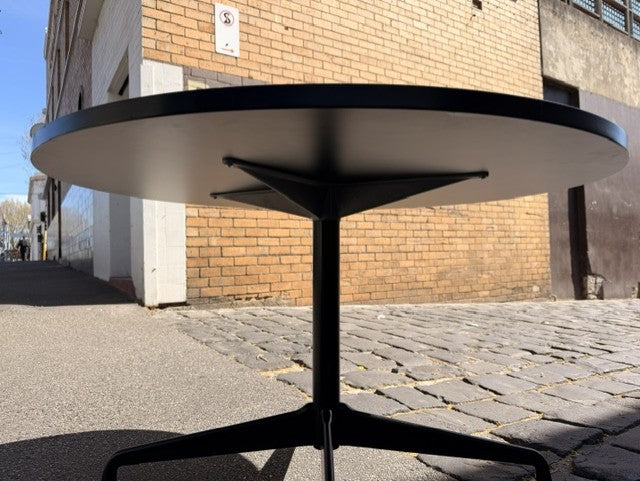 Segmented all black aluminium base table by Charles & Ray Eames for Herman Miller